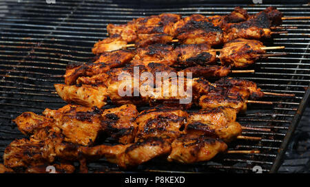 Chicken kebabs on grill Stock Photo