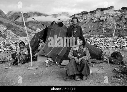 DOLPO FAMILY of the Amchi Lama with their TENT HOUSE in front of CHHARKA VILLAGE - DOLPO DISTRICT, NEPAL Stock Photo