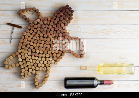 Turtle made of wine corks and two bottles of wine, viewed from above with copy space Stock Photo