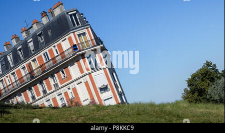 The Sinking house on Montmartre hill, an optical illusion taken from an unusual angle, Paris, France Stock Photo