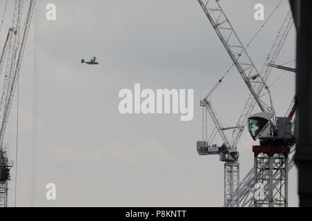 London, UK. 12th July 2018. President Trump's helicopter entourage flying towards Wembley Staduim, London, UK Credit: amanda rose/Alamy Live News Stock Photo