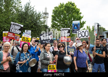 London, UK. 12th July, 2018. Protesters against the visit to the UK of US President Donald Trump attend a noise demonstration intended to create a 'wall of sound' outside Winfield House in Regents Park, the official residence of the US ambassador where President Trump is expected to stay this evening. The protest was organised by Together Against Trump. Credit: Mark Kerrison/Alamy Live News Stock Photo