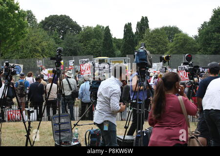 London, UK, 12 july 2018. The protest against President Trumps UK visit recieved a lot of media attention, with crowds of protesters  and news crews gathering in Regents Park near the US Ambasador's residence. Roland Ravenhill/Alamy Live News Stock Photo