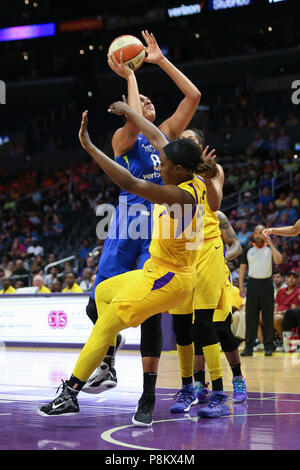 LOS ANGELES, CA - JULY 12: Dallas Wings center Elizabeth Cambage (8) charges Los Angeles Sparks center Jantel Lavender (42) during a WNBA game between the Dallas Wings and the Los Angeles Sparks on July 12, 2018 at Staples Center in Los Angeles, CA. (Photo by Jordon Kelly Cal Sport Media) Stock Photo