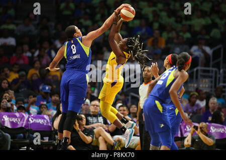 LOS ANGELES, CA - JULY 12: Dallas Wings center Elizabeth Cambage (8) blocks Los Angeles Sparks guard Chelsea Gray (12) shot during a WNBA game between the Dallas Wings and the Los Angeles Sparks on July 12, 2018 at Staples Center in Los Angeles, CA. (Photo by Jordon Kelly Cal Sport Media) Stock Photo