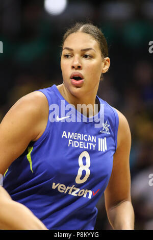 Dallas Wings center Elizabeth Cambage #8 walks off after being ejected