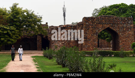 New Delhi, India. 12th July, 2018. People walk in Feroz Shah Kotla fortress in New Delhi, India, on July 12, 2018. Credit: Zhang Naijie/Xinhua/Alamy Live News Stock Photo
