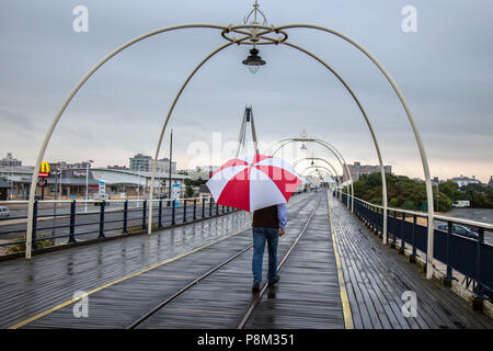 Southport, Merseyside, 13/07/2018. UK Weather. Heavy overnight rain falls on the resort with further thundery showers forecast for the north-west coast during the day. Credit: MediaWorldImages/AlamyLiveNews Stock Photo