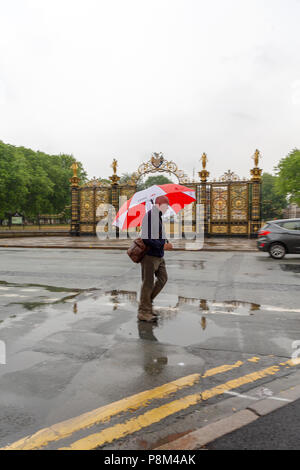 Warrington, Cheshire, UK. 13th July, 2018. Following a heatwave that lasted several weeks the people of Warrington in Cheshire awoke to find their journey to work and school would be wet after a night of rain Credit: John Hopkins/Alamy Live News Stock Photo