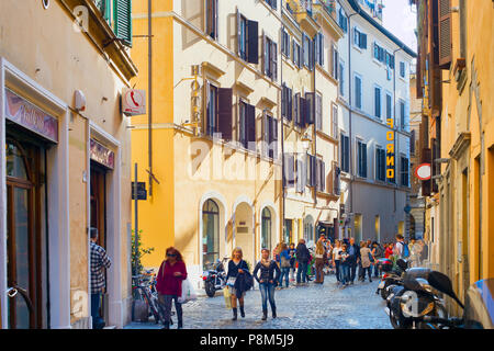 ROME, ITALY - NOV 01, 2016: People walking on Old Town street of Rome. Rome is the 3rd most visited city in the EU, after London and Paris, and receiv