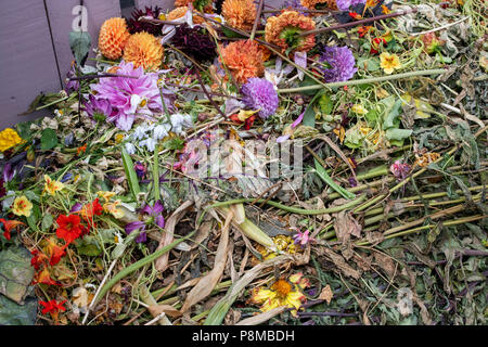 Garden waste on a compost heap made of pallets at a flower show. UK Stock Photo