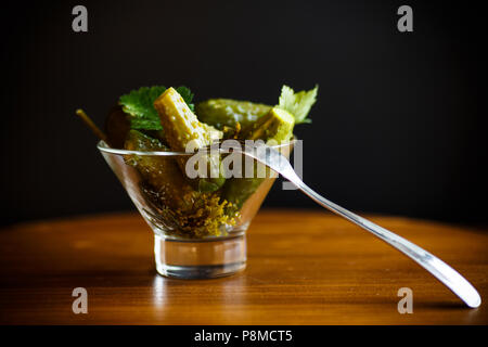 Pickled cucumbers with herbs and spices Stock Photo