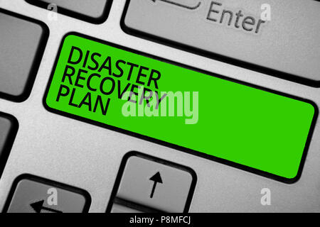 Word writing text Disaster Recovery Plan. Business concept for having backup measures against dangerous situation Keyboard green button hit key typing Stock Photo