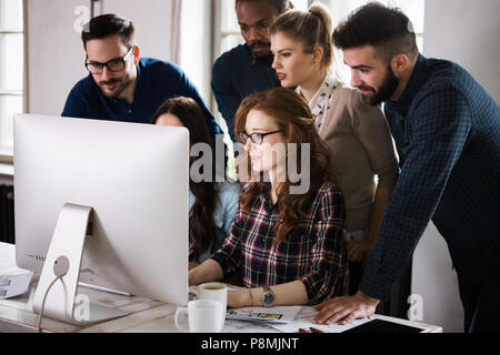 Young architects working on project in office Stock Photo