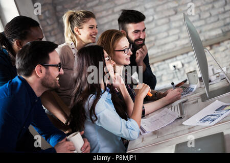Young architects working on project in office Stock Photo