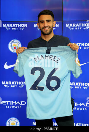 Riyad Mahrez wears Al-Ahli jersey after signing from Man City