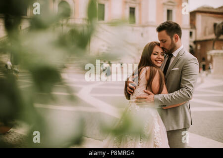 Young wedding couple on Capitoline hill in Rome, Italy Stock Photo - Alamy