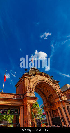 COPENHAGEN, DENMARK - JUNE 15, 2018: Entrance to Tivoli Gardens amusement park in Copenhagen, Denmark. Park was opened in 1843 and  is second oldest o Stock Photo