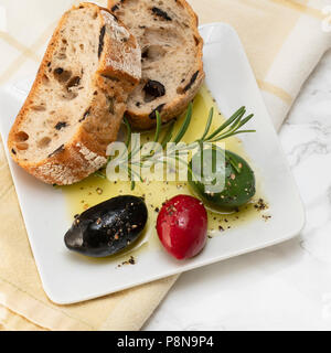 Appetiser of bread and olives