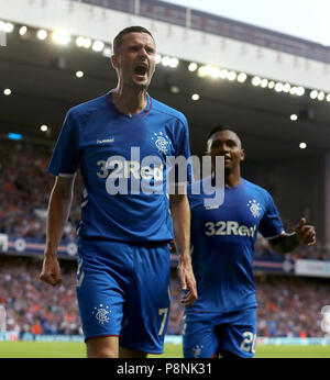 Rangers Jamie Murphy (left) celebrates scoring his side's first goal of the game during the Europa League, Qualifying Round One, First Leg match at Ibrox, Glasgow. Stock Photo