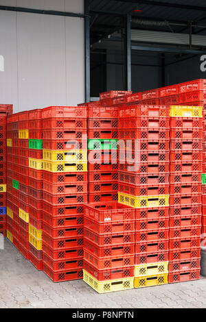 empty plastic crates, stacked in a pile Stock Photo