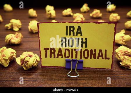 Handwriting text writing Ira Roth Traditional. Concept meaning are tax deductible on both state and federal Yellow sticky card clipped text notice cru Stock Photo