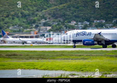 Montego Bay, Jamaica - April 11 2015: JetBlue aircraft on the runway at Sangster International Airport (MBJ) in Montego Bay, Jamaica. Stock Photo