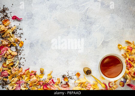 Cup of tea and dried rose petal with copy space for your text Stock Photo