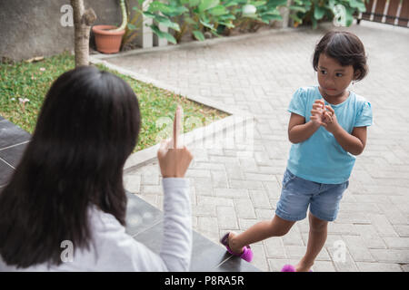 Portrait of asian mother scolding to her daughter Stock Photo