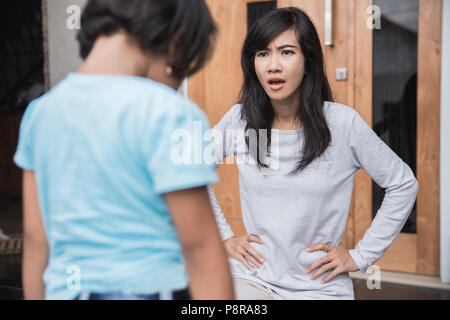Portrait of asian mother scolding to her daughter Stock Photo