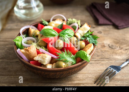 Panzanella Tomato Salad with cherry tomatoes, basil and ciabatta croutons. Summer healthy food - panzanella salad, copy space. Stock Photo