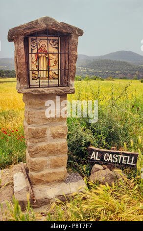 Roadside shrine near castle in Balsareny, Catalonia, Spain Stock Photo