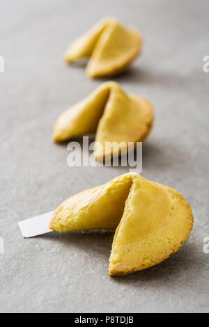 Fortune cookies pattern on gray stone background Stock Photo