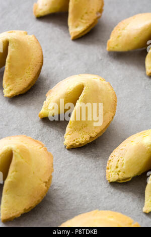 Fortune cookies pattern on gray stone background Stock Photo