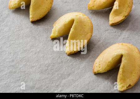 Fortune cookies pattern on gray stone background Stock Photo