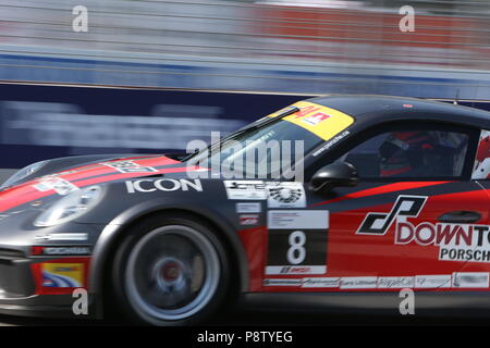 Toronto, Canada. 13th July 2018. The green flag is out as the practice is underway at Honda Indy festivities in Toronto Ontario Canada. Drivers warm up on the streets of Toronto getting ready for tomorrow’s qualifying run and the race on Sunday July 14th. Panning shot of Stefan Rzadzinski. Luke Durda/Alamy Live News Stock Photo