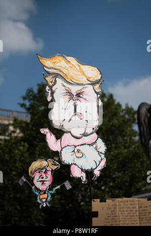 London, UK.  13 July, 2018. Tens of thousands of people marched and protested against the Trump visit to the UK. The march started in Regent Street and ended in Trafalgar Square. Credit: Ilyas Ayub / Alamy Live News Stock Photo