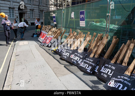 London, UK. 13 July 2018. Trump demonstration. Signs are made ready for the protest. Stock Photo