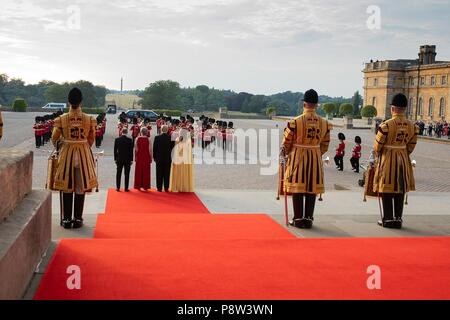 London, UK, 13 July 2018. U.S President Donald Trump and First Lady Melania Trump during the formal arrival ceremony at Blenheim Palace hosted by Prime Minister Theresa May and Philip May July 12, 2018 in Oxfordshire, England. Credit: Planetpix/Alamy Live News Stock Photo