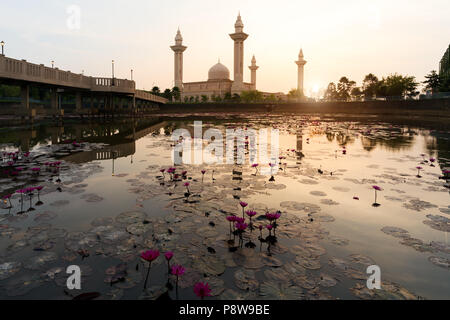 Morning sunrise sky of Masjid Bukit Jelutong in Shah Alam near Kuala lumpur, Malaysia. Also known as Mosque of Tengku Ampuan Rahimah. Stock Photo