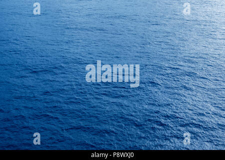 Vast blue ocean background with moderate waves Stock Photo