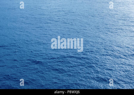 Vast blue ocean background with moderate waves Stock Photo