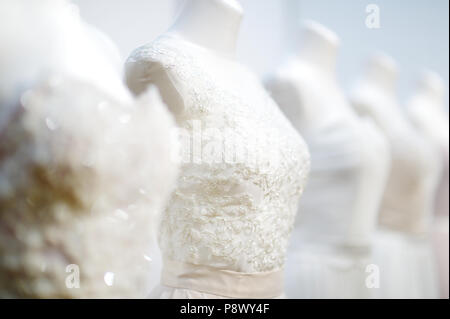 Beautiful wedding dresses on a mannequins Stock Photo