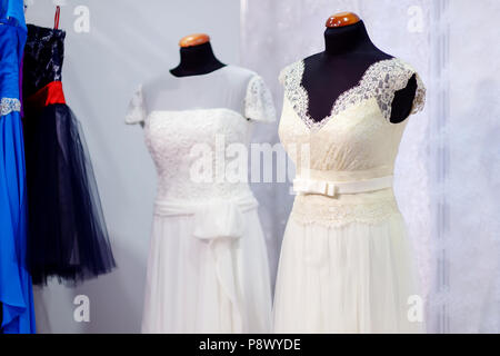 Beautiful wedding dresses on a mannequins Stock Photo