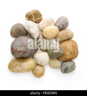 Different kind of river stones against white background with a soft shadow. Stock Photo