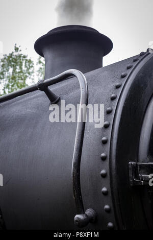 Detail of steam train at Waybourne station, Norfolk, England Stock Photo