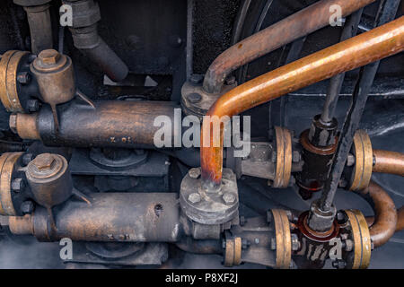 Detail of steam train at Waybourne station, Norfolk, England Stock Photo