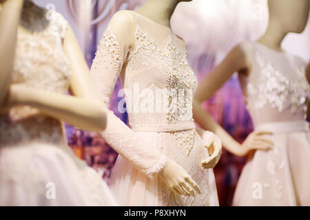 Beautiful wedding dresses on a mannequins Stock Photo