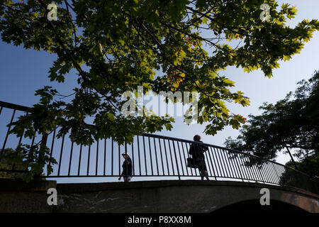 Pedestrians on the Esplanade along the Charles River, Boston Massachusetts Stock Photo