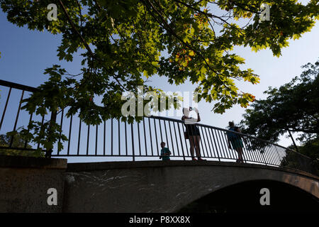 Pedestrians on the Esplanade along the Charles River, Boston Massachusetts Stock Photo